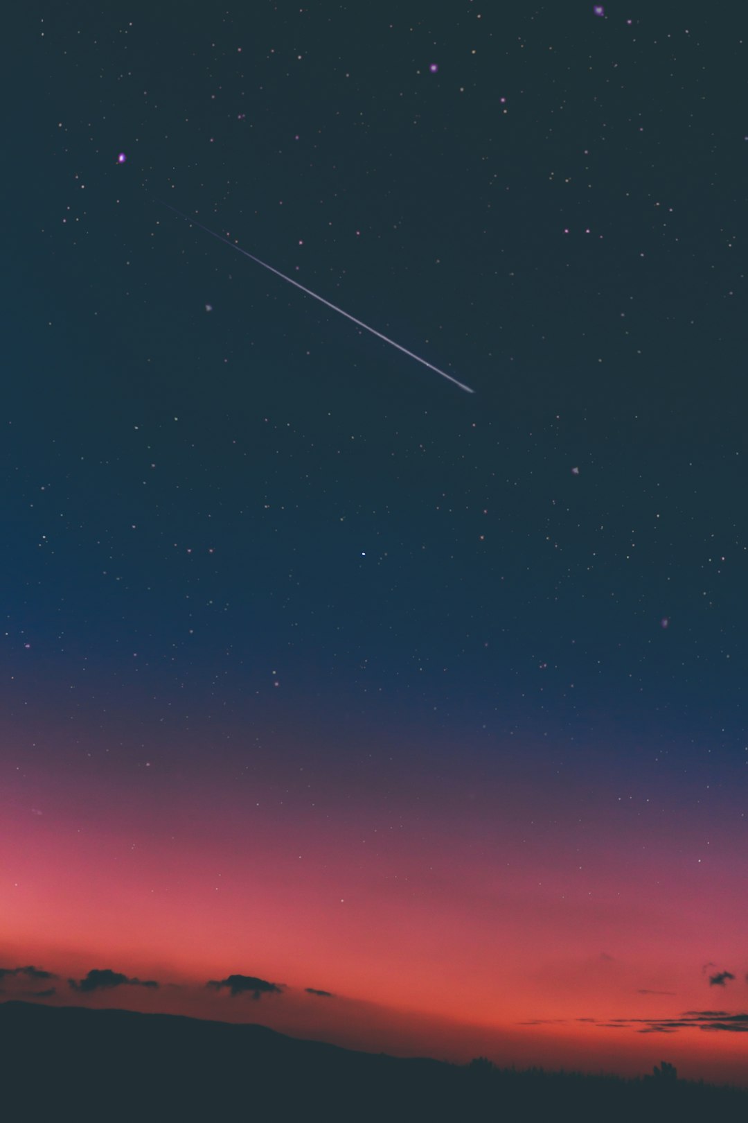 shooting star in night sky