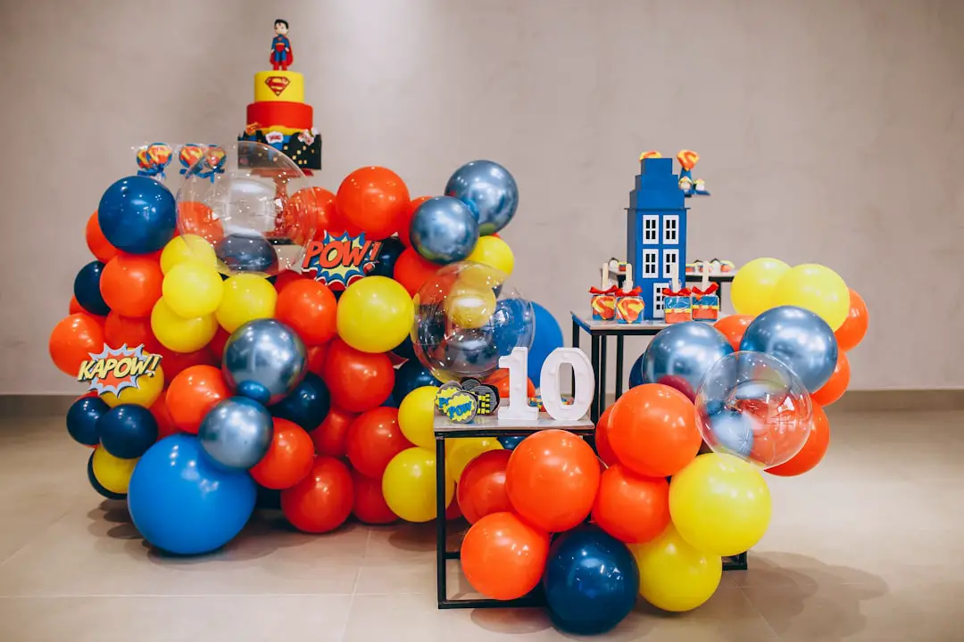 a bunch of balloons that are on a table
